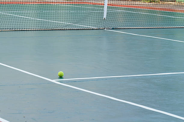 Rénovation terrain de tennis en béton poreux Paris
